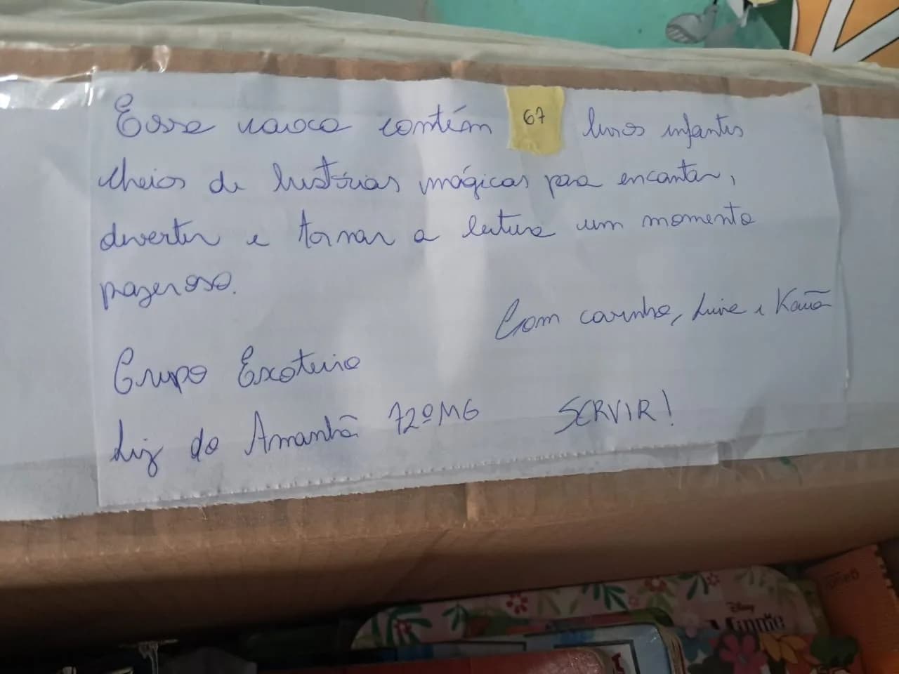 Bilhete de doação de 67 livros infantis do Grupo Escoteiro Luz do Amanhã